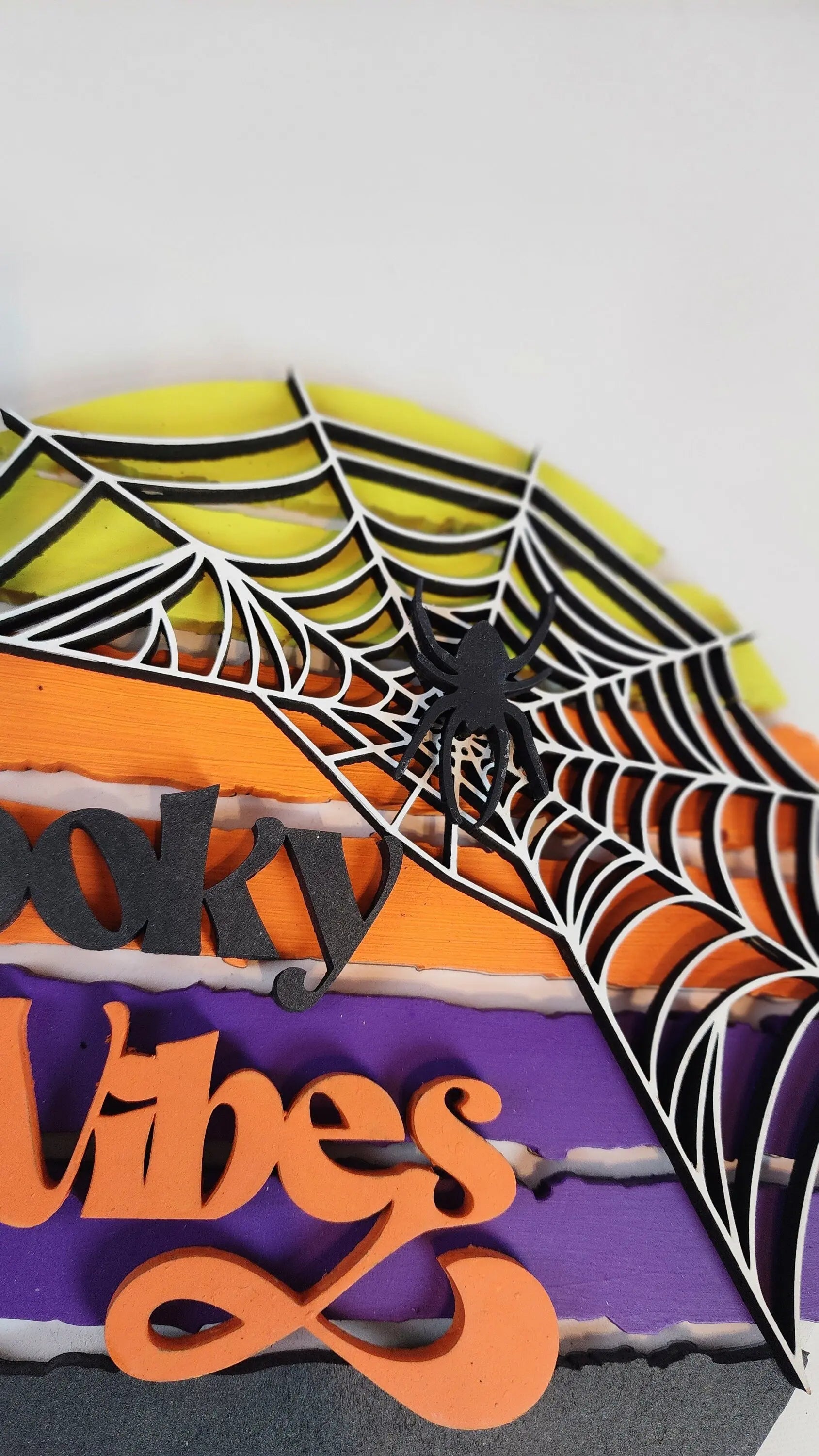 Spooky Vibes Round Door Sign: Handmade Halloween Décor with Spider Web & Halloween Colors – Unique, One-of-a-Kind Seasonal Art Piece.