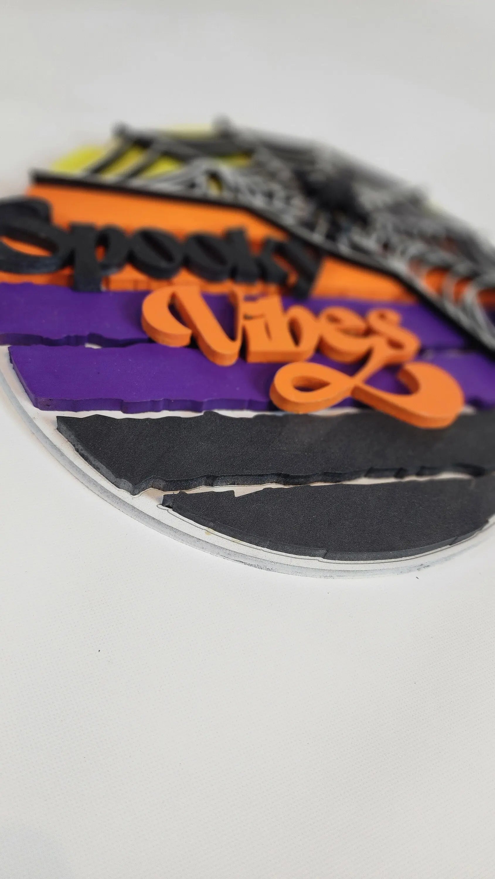 Spooky Vibes Round Door Sign: Handmade Halloween Décor with Spider Web & Halloween Colors – Unique, One-of-a-Kind Seasonal Art Piece.